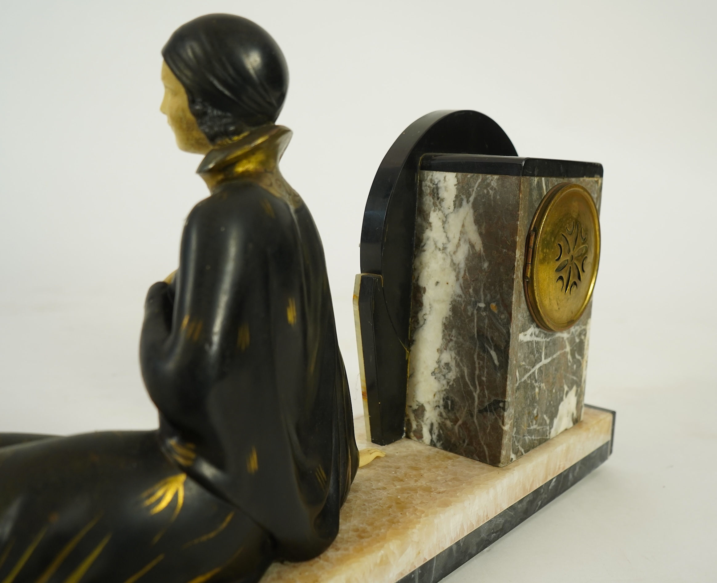 Attributed to Uriano (Ugo Cipriani, Italian, 1897-1960), a French Art Deco marble clock garniture